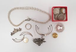 Silver leaf brooch, a beaded necklace, a silver-coloured metal full eternity ring, quantity of coins