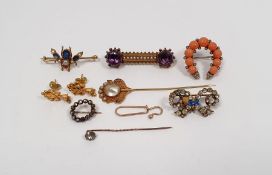 Victorian gold-coloured bar brooch set with amethysts and seedpearls, a gold-coloured unmarked