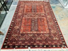 Modern Royal Keshan red ground wool pile carpet with central duplicated rectangular design with