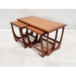 Mid 20th century G-Plan 'Astro' teak coffee table with two nesting tables, 50cm x 99cm x 50cm