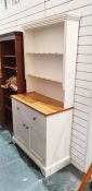 Modern painted pine dresser with moulded cornice, two shelves to rectangular top, two drawers