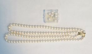 A double string of cultured pearls on a 14ct gold clasp, marked 585, in a Crouch The Goldsmiths
