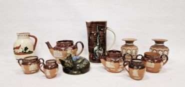 Royal Doulton stoneware teapot and various Doulton stoneware teapots and jugs, a pair of Doulton