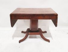 19th century mahogany sofa table with drop ends, two drawers, single faceted pedestal to four
