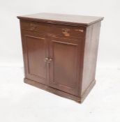Brown painted cupboard, the rectangular top with single drawer and two cupboard doors, to plinth