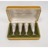 Cased set of four Gorham American sterling shot glasses, each 7cm high approx. and each 0.6ozt