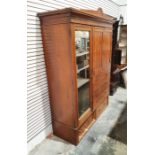 Edwards & Roberts Edwardian walnut compactum with shaped cornice to two cupboard doors, above