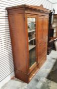 Edwards & Roberts Edwardian walnut compactum with shaped cornice to two cupboard doors, above