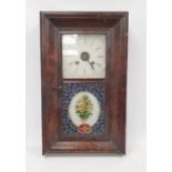 An American 30-hour weight driven wall clock by Ansonia with floral painted lower glass door