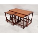 Mid 20th century G-Plan 'Astro' teak coffee table with two nesting tables, 50cm x 99cm x 50cm