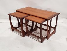 Mid 20th century G-Plan 'Astro' teak coffee table with two nesting tables, 50cm x 99cm x 50cm