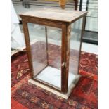 20th century stained pine table-top display cabinet with four glazed glass panels including door, on
