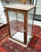 20th century stained pine table-top display cabinet with four glazed glass panels including door, on