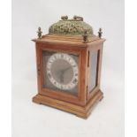 Early to mid 20thC bracket style clock. The gong striking movement by Garrard in three-glass case