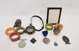 Assorted items to include bakelite napkin rings, an Anglo-Swiss military compass marked 'No.37319