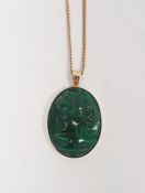 14ct gold-mounted oval malachite cameo pendant on a gold-coloured chain, 9.4g total approx.