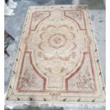 Large modern cream ground rug with central floral medallion with floral border  270cm x 184cm