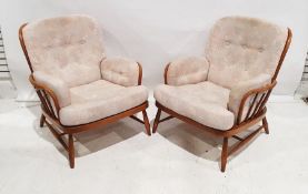 Pair of Ercol stickback armchairs in pale patterned upholstery (2)