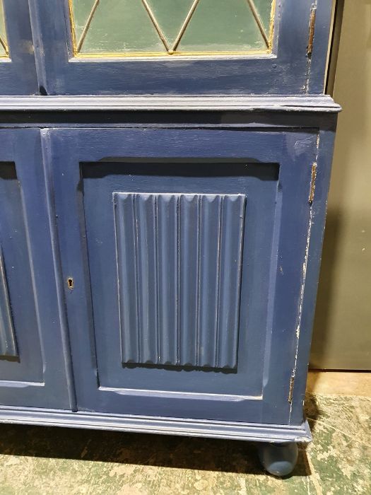 20th century painted cabinet, the leaded glazed doors enclosing shelves above two linenfold cupboard - Image 8 of 21