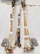 11 cane shafted polo mallets, two polo helmets, four hockey sticks and a lacrosse stick (18)