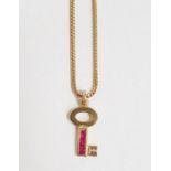 Theo Fennell 18K gold and ruby miniature key-pattern pendant and the herringbone-pattern flexible