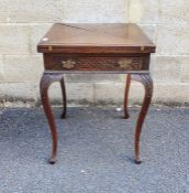 20th century mahogany fold out envelope-top card table with single drawer on cabriole legs