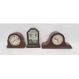 An american 19th century mantel clock by Teutonia Clock Co. with painted glazed door and two further