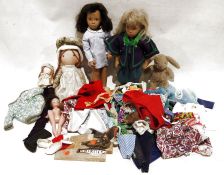 Two Sasha dolls and assorted dolls clothing Condition ReportBoth have some light surface scratches/