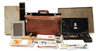 Leather Gladstone bag, a quantity of Ordnance Survey maps to include the Lake District, the