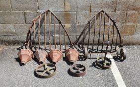 Set of four vintage cast iron ogee-shaped drain pipe hoppers, two hay baskets, various cast iron