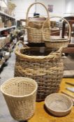 Large wicker basket and assorted wicker items to include a wine basket, various baskets, bin, etc (
