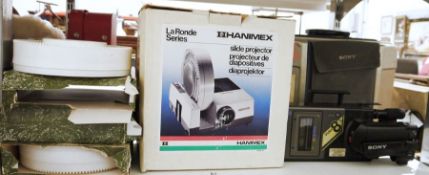 Hanimex La Ronde series slide projector, a Sony video 8 CCD-V7AF-E video camcorder with metal hard