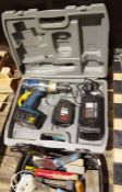 Ryobi MSBC-1800 drill in case, a Bosch PST55-PE saw, a Black & Decker hedge trimmer, a Makita HP1500