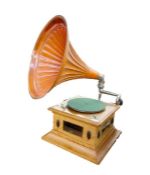 Early 20th century oak cased pathephone with meltrope sound box and orange fluted horn, 35.5cm