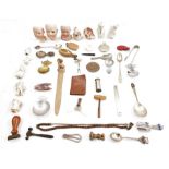 Quantity of mixed collectables to include dolls heads, rulers, caddy spoons, weights, seals, etc (