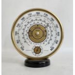 Mid 20th century Jaeger desk barometer, of circular form, with gilt metal frame, the dial with a