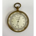 Late 19th century European brass cased compensated pocket barometer, the silvered dial numbered