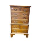 A 20th century small mahogany chest on chest, 47.5cm by 82cm by 30cm approx. Condition