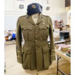 WWI uniform jacket to an officer in the Royal Sussex Regiment produced by Dewsbury & Son, Newgate