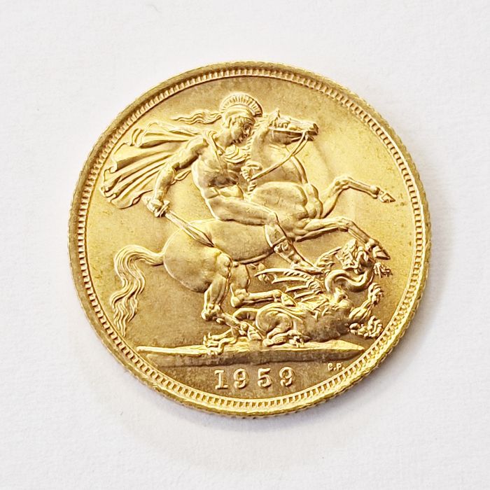 Gold sovereign 1959 Condition ReportVery light wear to the edges of the coin, vf