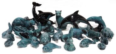 Large quantity of Poole pottery animal models to include dolphins, cats, seals, badgers, crocodiles,
