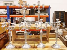 Set of six large five-branch polished silver-coloured metal candelabras, 65cm (6)