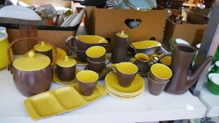 Poole pottery 'Twintone' brown and yellow part dinner/coffee service to include coffee pot, milk