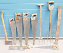 Quantity of tools to include an axe, saws, a Black & Decker circular saw, a Bosch jigsaw, a