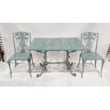 Cast metal painted garden table and six chairs with pierced floral decoration (7) Condition
