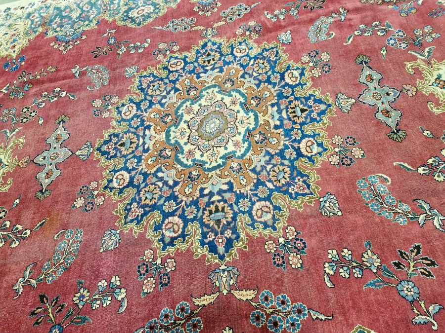 North East Persian Signed red ground Meshed carpet with large centralised floral medallion - Image 4 of 5