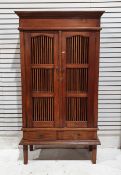 Chinese Ming style slatted wooden cabinet, the slatted doors revealing two shelves above two short