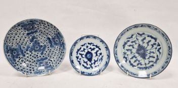 Three assorted Chinese blue and white plates to include two similar with seal marks to base and a