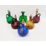 Five coloured glass bottles with metal mounts, 19th century, with white/gilt metal collar and