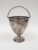 Early 20th century silver pedestal basket, pierced and engraved decoration, on a circular base,